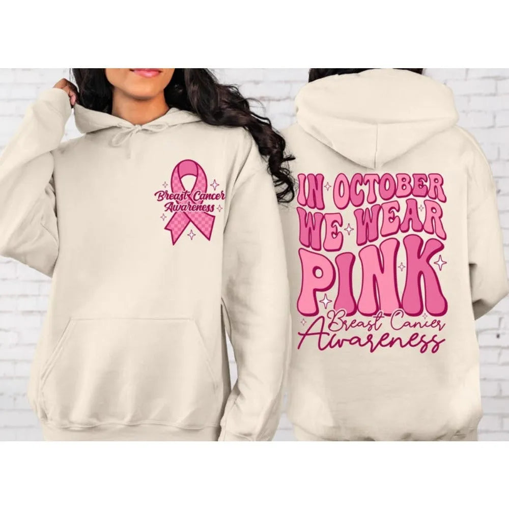 Retro print breast cancer awareness pullover hoodie with side seam pockets in pink.