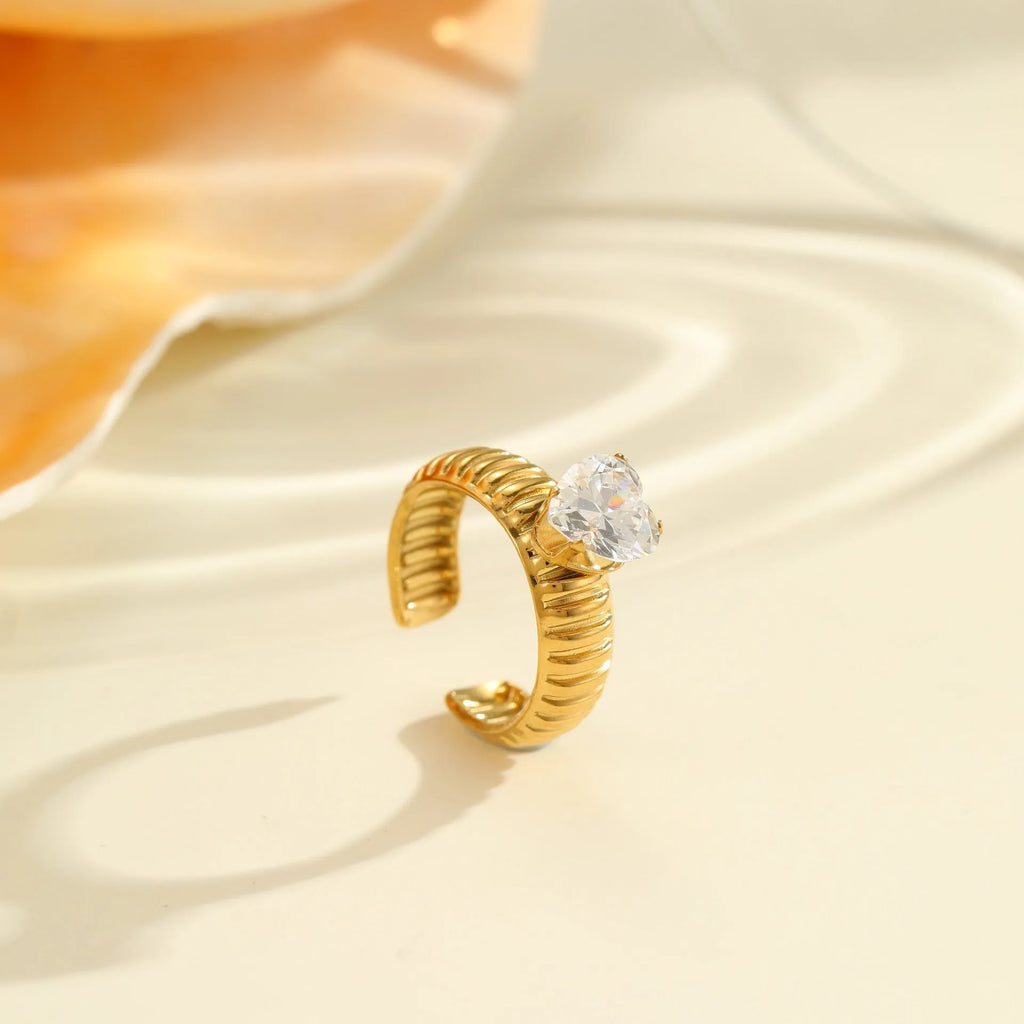 Gold inlaid zircon stainless steel ring with open mouth geometry heart drop design