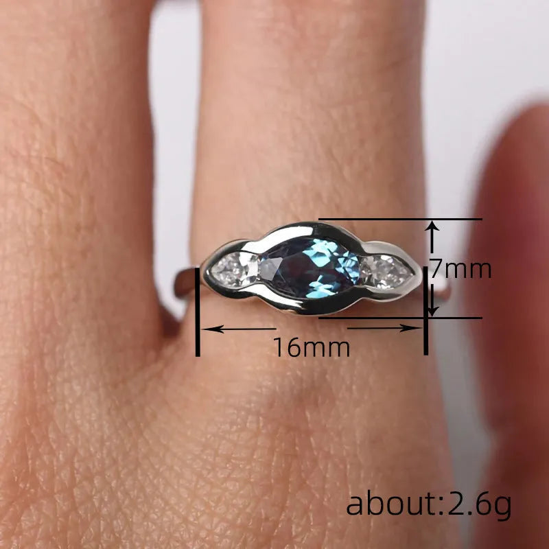 Geometric ellipse zircon ring in white gold colour showing contemporary design
