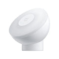 White square Mijia Bluetooth bedside table lamp with motion sensor on a wooden nightstand.
