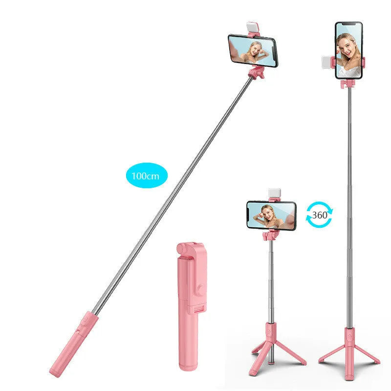 Black Bluetooth selfie stick with extended tripod legs and phone holder, shown with a smartphone attached.