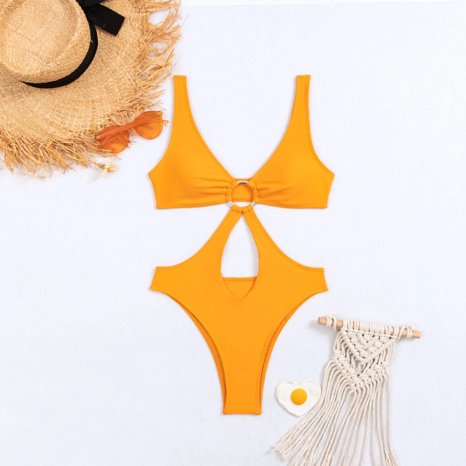 Women's black sleeveless triangle one-piece swimsuit made from nylon fabric