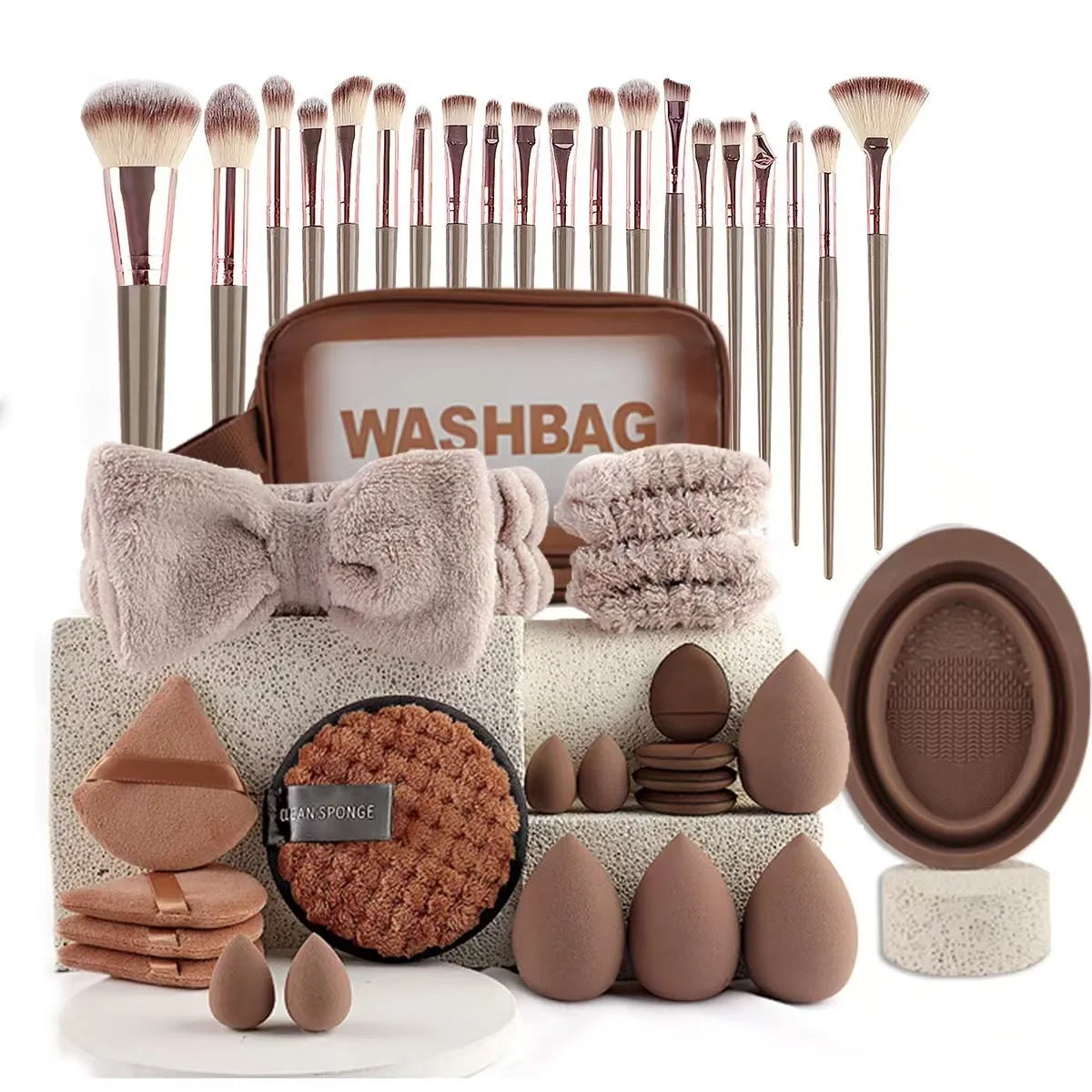 Beauty tool set with multiple pieces in brown, pink and purple colours for face wash and makeup application