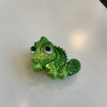 Dinosaur-themed acrylic jaw hair clip showing detailed dinosaur design and secure grip mechanism