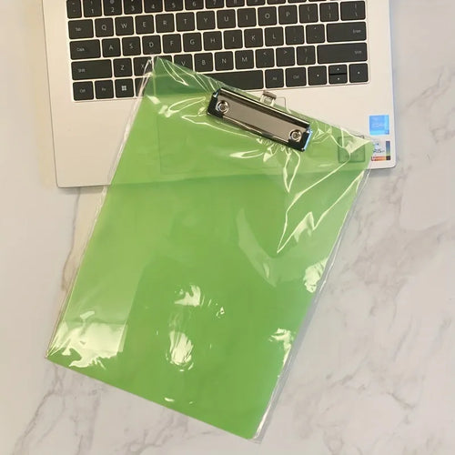 Transparent A4 plate writing board holder with metal clip, shown in blue colour on a desk.