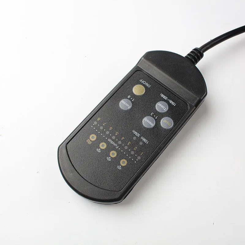 Black infrared heating massage mat with AC power cord and adjustable speed controls for physiotherapy use
