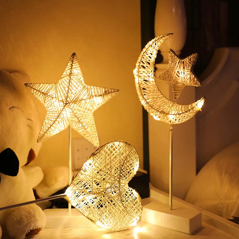 Rattan and PC LED star, heart, and moon shaped battery operated decorative lamps.