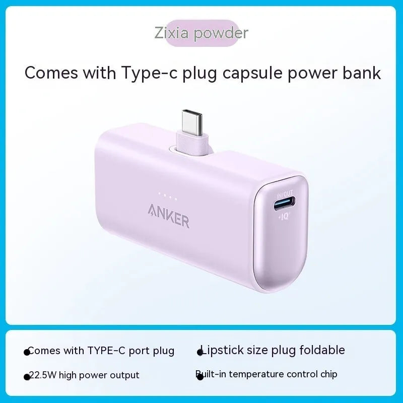 Small capsule-shaped power bank in five colours with a foldable USB-C cable attached