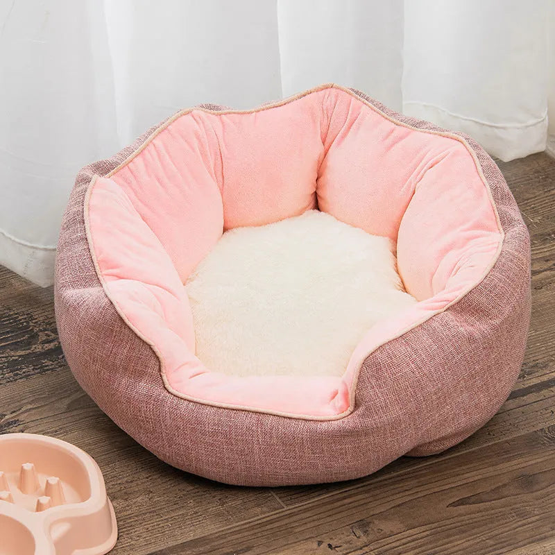 Blue octagonal pet bed with raised sides and a removable mat, for a small dog or cat.