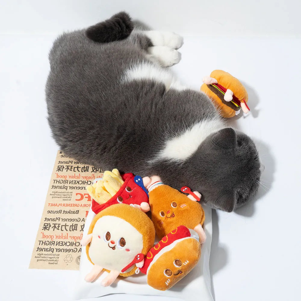 Five soft chew toys for kittens shaped like hamburger, chicken leg, fries, bread, and hot dog