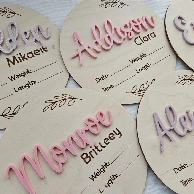 15cm square plywood baby name sign with birth details in one of three available style variants
