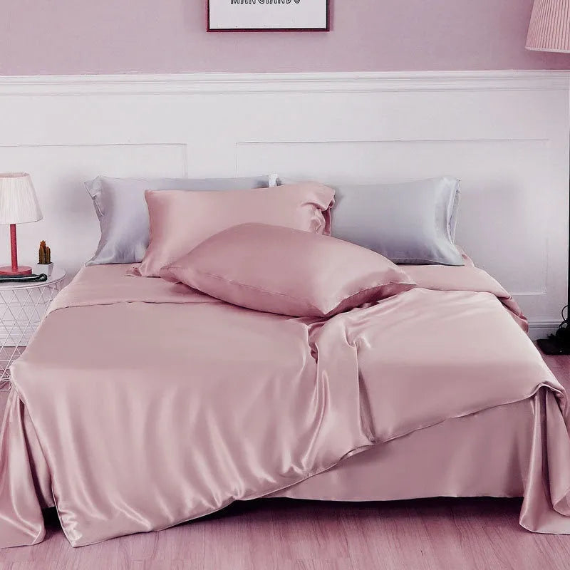 Double-sided solid colour silk duvet cover in bright brown laid flat on a bed.