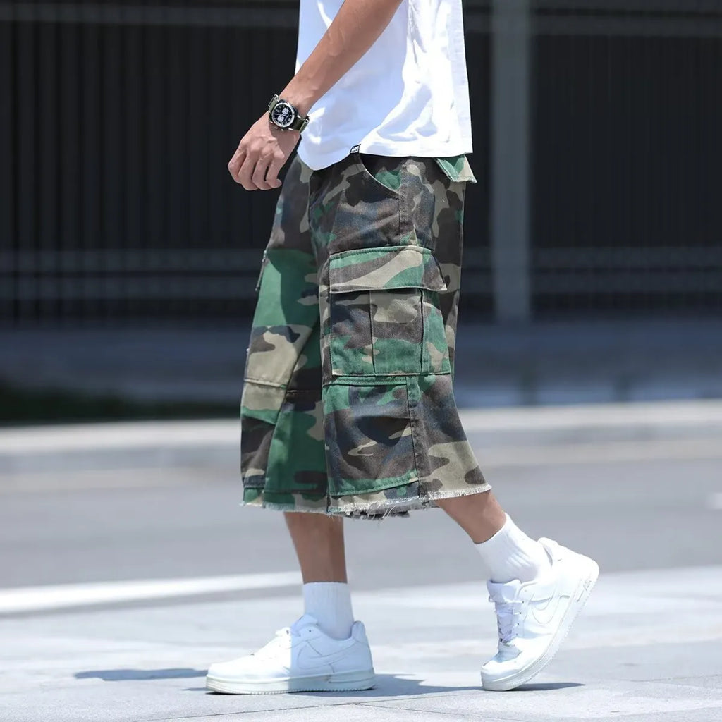 American retro camouflage work shorts in loose cropped fit on mannequin