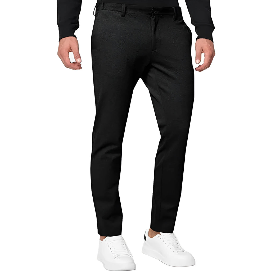 Men's slim-fit tapered chino trousers in Army Green colour, showing zipper fly and casual styling.