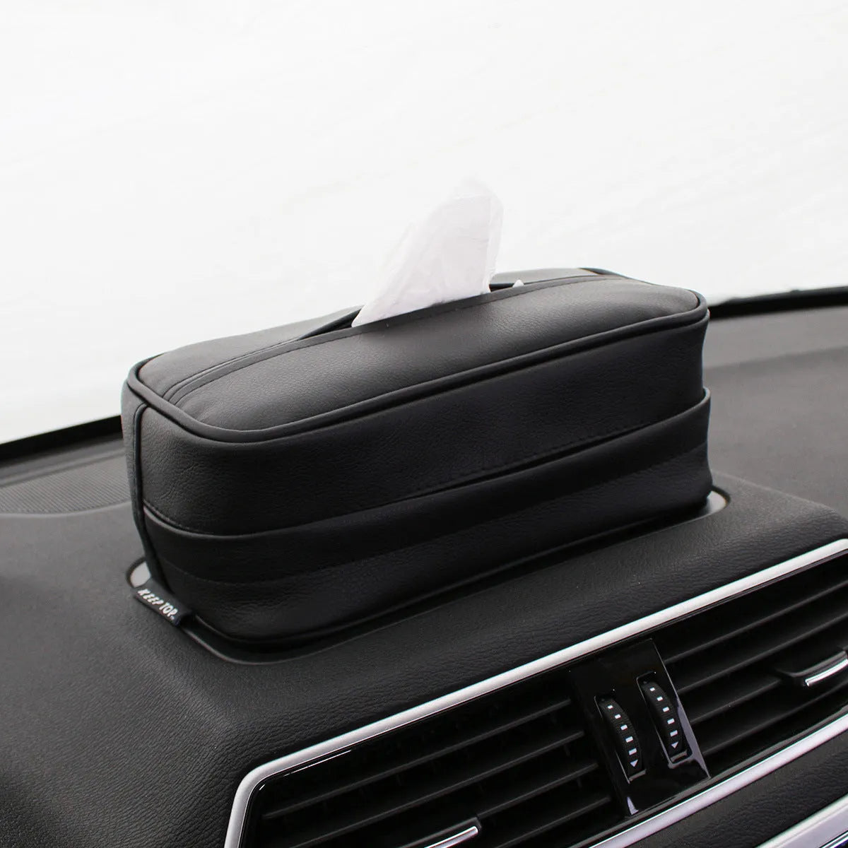 Black PU leather hanging storage bag with hook for car or home organisation