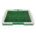Green artificial grass dog toilet tray with three layers for indoor puppy potty training.