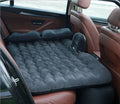 Universal inflatable car bed with flocking material, shown with pump, pillows, and storage bag.