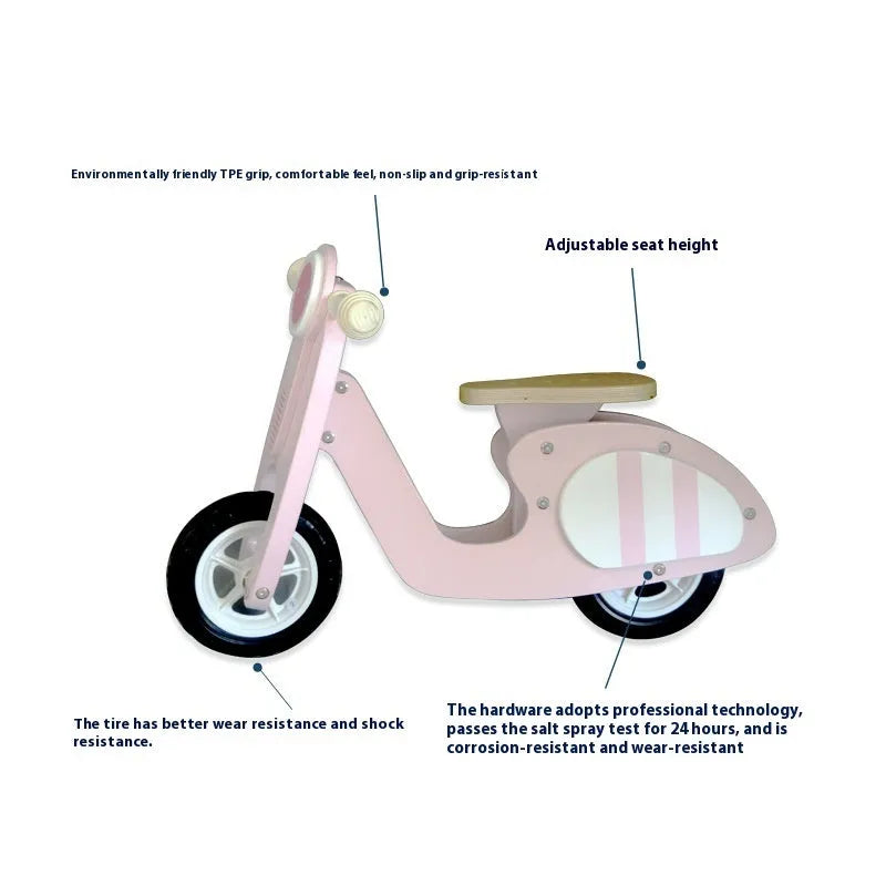 Pink wooden balance scooter for toddlers and young children on a 10-inch wooden deck.