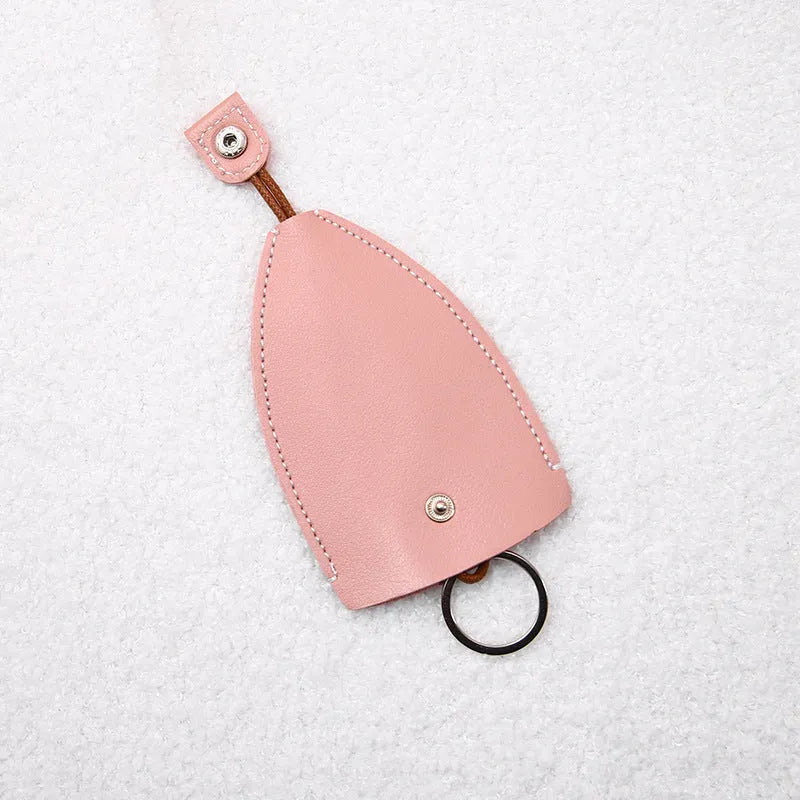 Cartoon pull-out key case in PU leather measuring 14 by 7.5 centimetres