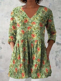 Women's printed wave dress with 3/4 sleeves and loose wide waist fitting in polyester fabric