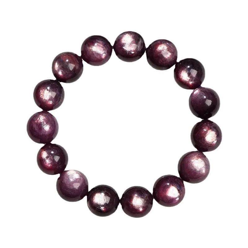 Purple lepidolite crystal round bead bracelet with polished finish on a wrist.