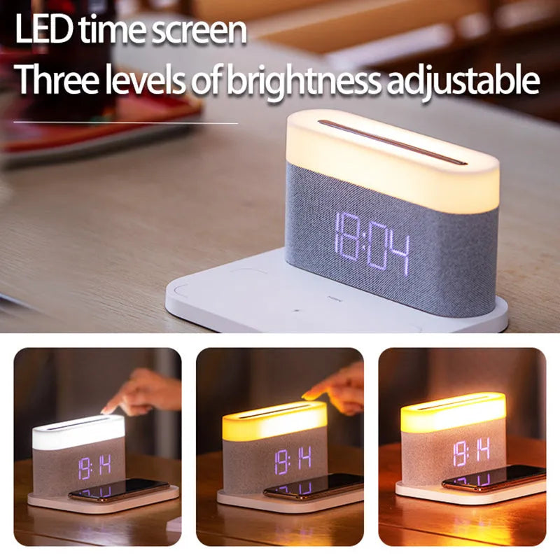 Mini black and white desk lamp with integrated wireless charging pad and clock display.