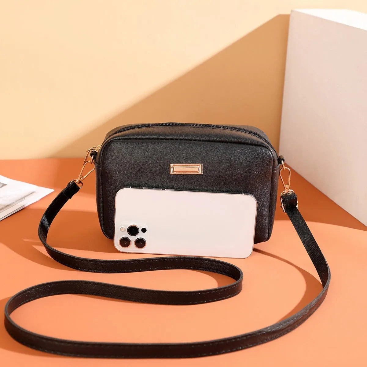 Solid colour minimalist ladies shoulder bag in PU leather with a three-dimensional pocket