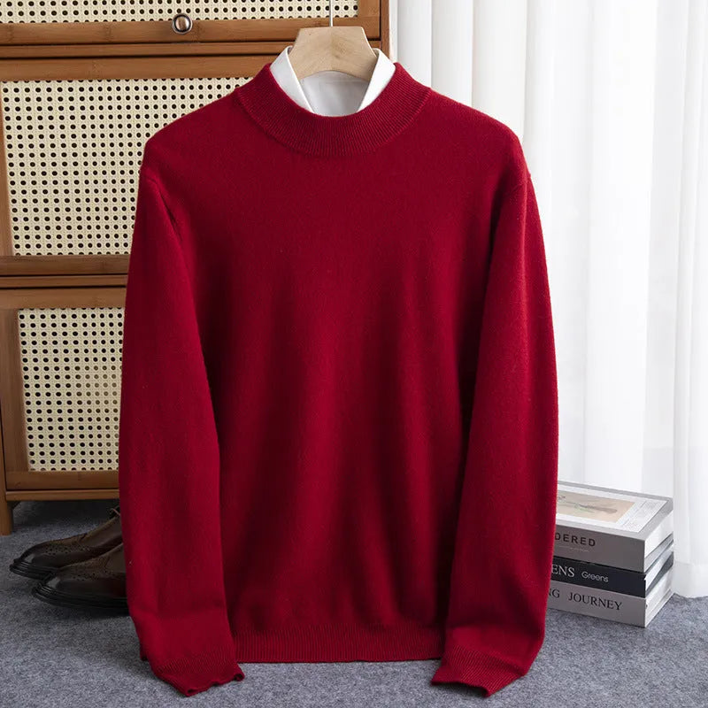 Man wearing a chunky knit half-turtleneck wool sweater in a loose fit.