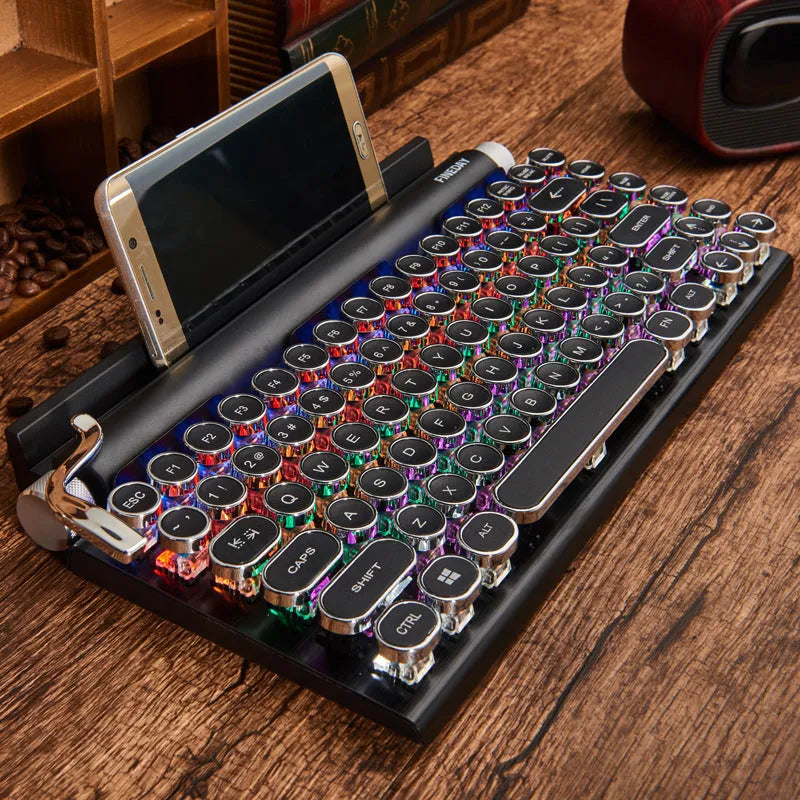 Black retro typewriter-style mechanical keyboard with Bluetooth connectivity and seven-colour backlight