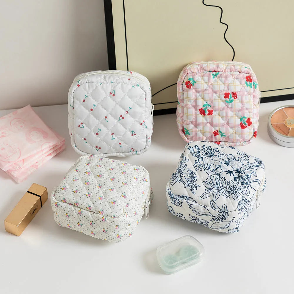 Floral pattern key storage bag made from breathable polyester fabric in various colour options.