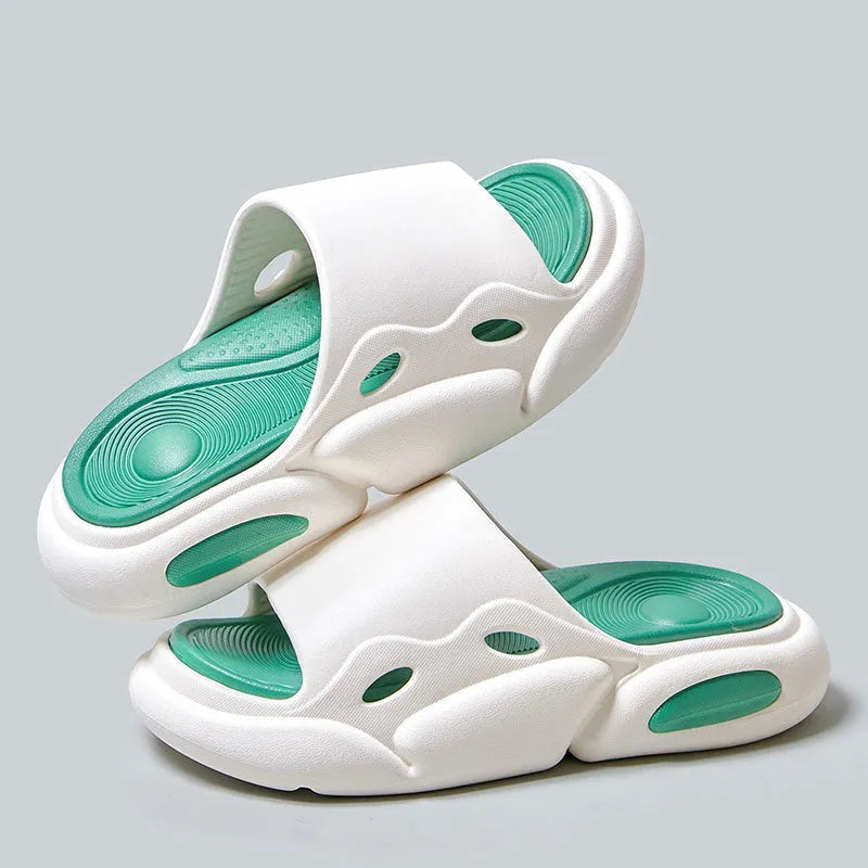 Two-colour EVA foam couple slippers with thick soles and leather lining in black white combination