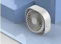USB desk fan with alarm clock display in blue, showing rotating head on a modern base.