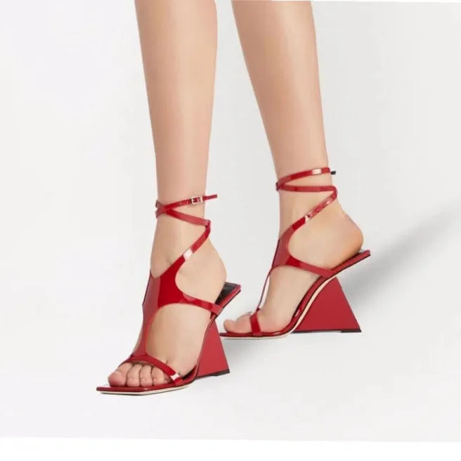 Women's black microfiber high heel sandals with a square toe and button fastening on a 9.5cm rubber heel.