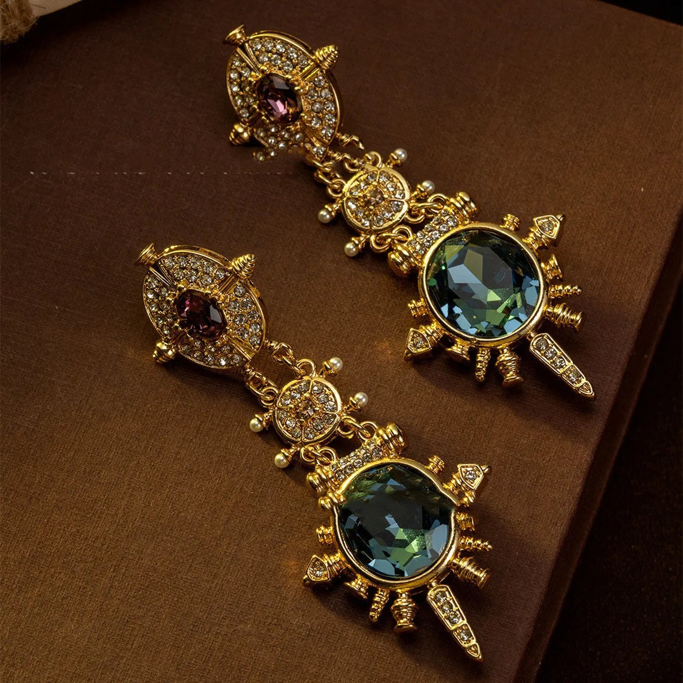Gold geometric retro stud earrings with round shape and alloy construction