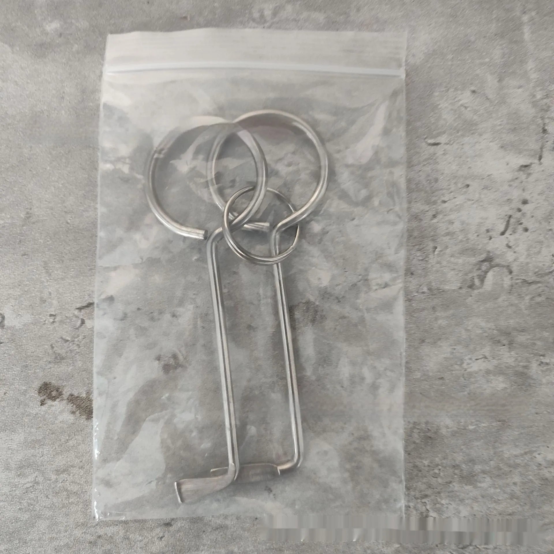 Two alloy wrench tools side by side showing portable universal design for household repairs