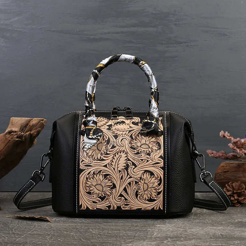 Genuine leather retro messenger bag in black with multiple interior compartments and shoulder strap