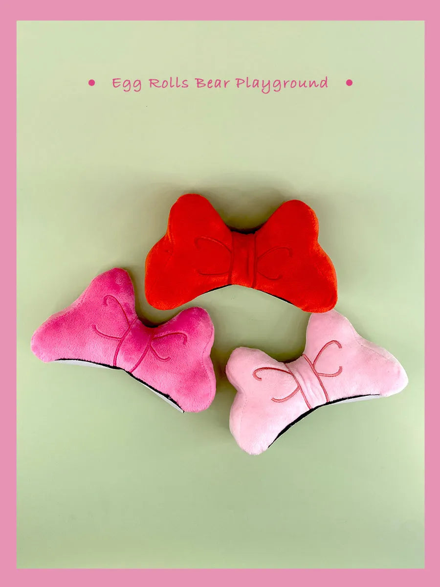 Plush bow helmet decoration with hairpin clip in red, pink, or peach pink for motorcycle and ski helmets.