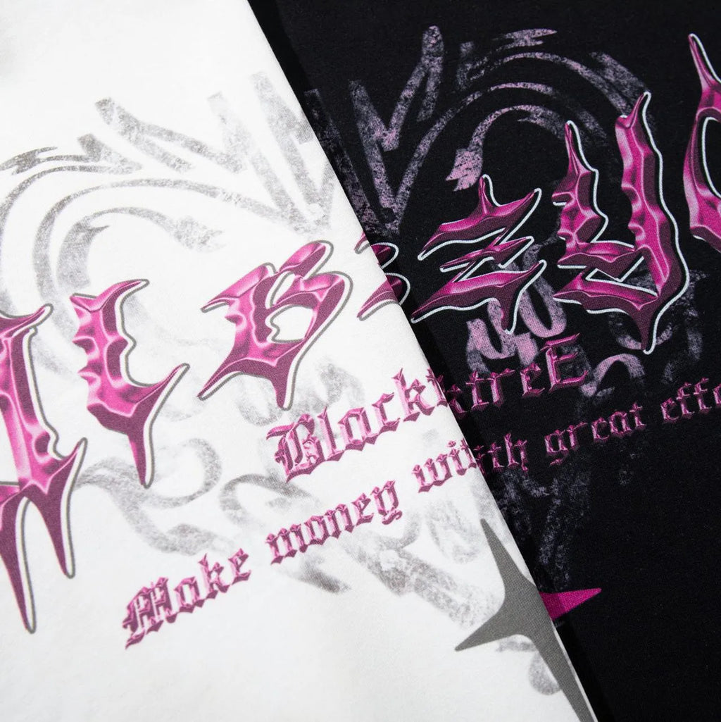 Men's black cotton t-shirt with retro printed design showing loose fit and short sleeves