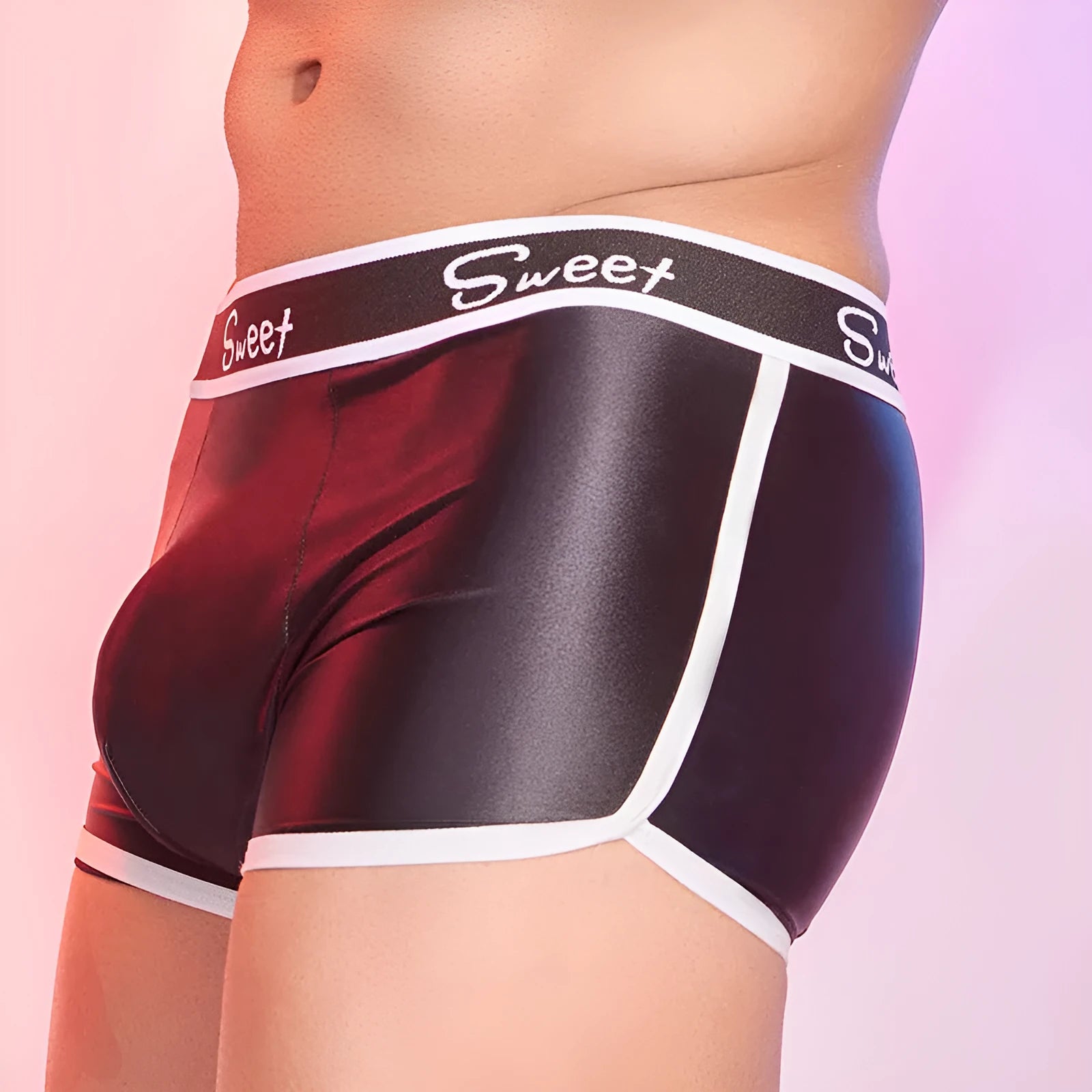 Men's nylon boxers in black, sapphire blue, and white colours, showing silky fabric texture.