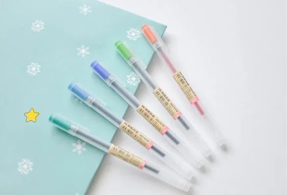 MUJI 12-piece gel pen set with black ink and 0.5mm fine nibs showing anti-leakage mechanism