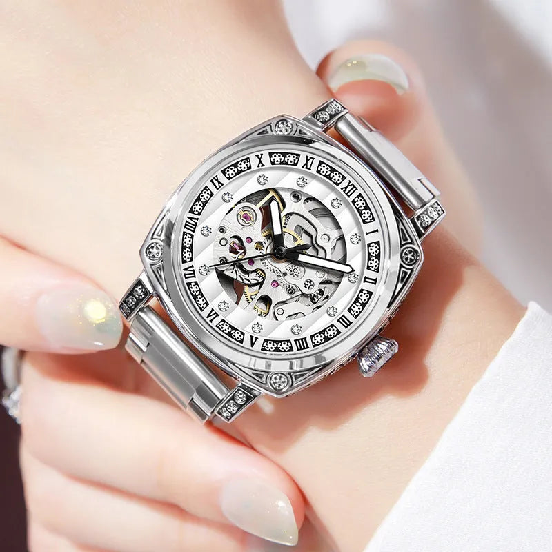 Men's mechanical watch with luminous hands on a leather strap, showing black, red, steel, and white colour options.