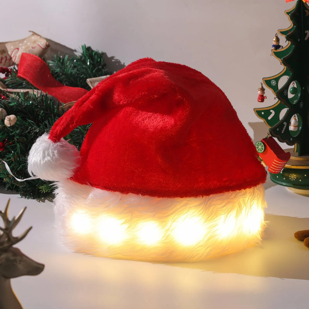 Red and white plush Santa hat with pom-pom and multicolour LED lights lit up around the base.