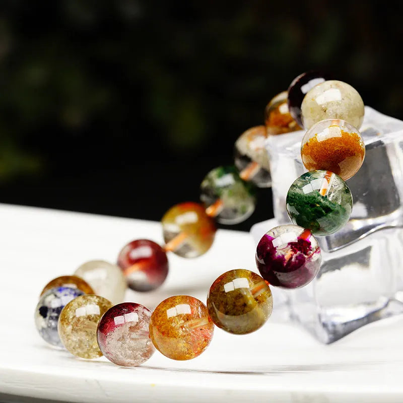 Natural colour crystal ghost cornucopia bracelet with 10mm beads and ethnic style design