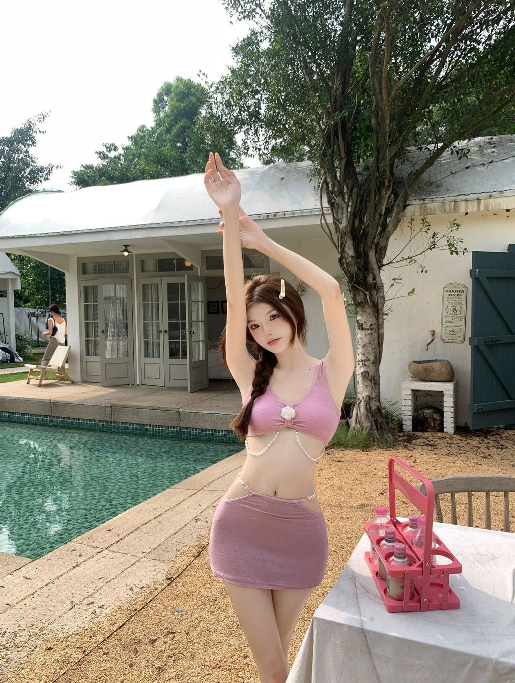 Polyester three-piece bikini swimsuit set in black or pink colours with briefs style design