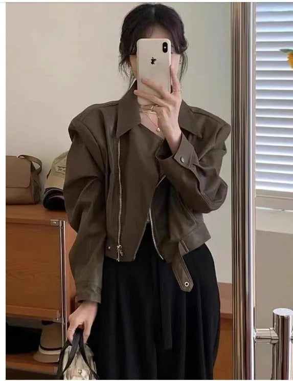 Women's slim fit imitation leather jacket in black with 40cm length and street fashion styling