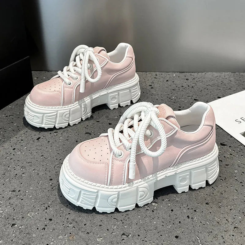 Women's beige and pink casual leather shoes with a rubber foam sole on a white background