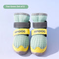 Pair of light blue cartoon-style dog shoes on a white background for summer paw protection.