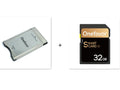 Stainless steel SD to PCMCIA adapter card with a 32GB SDHC card for Mercedes-Benz vehicles.