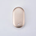 Rechargeable mini hand warmer and power bank device showing various colour options including rose gold and sky blue