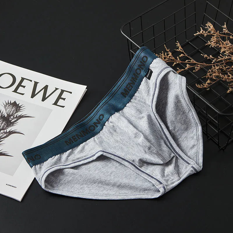 Men's low waist cotton briefs showing two-tone colour combinations including black/blue and white/red options